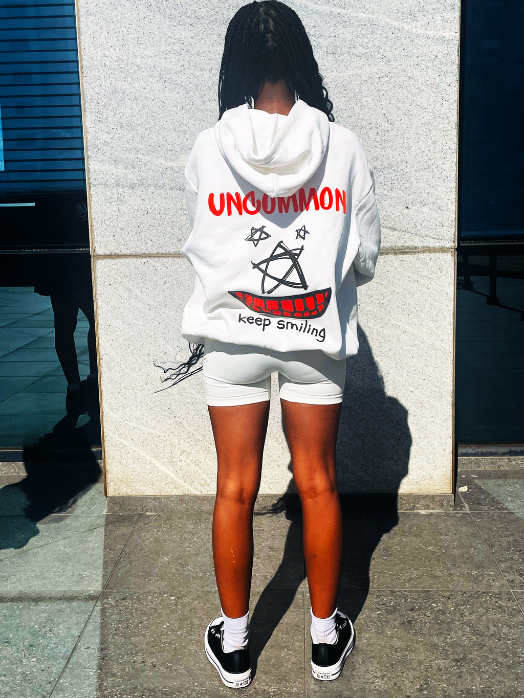 UNCOMMON "KEEP SMILING" HOODIE